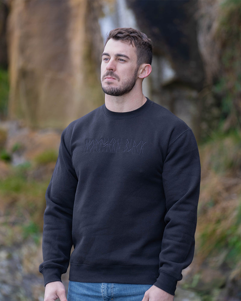 black jumper with northern black logo embroidered
