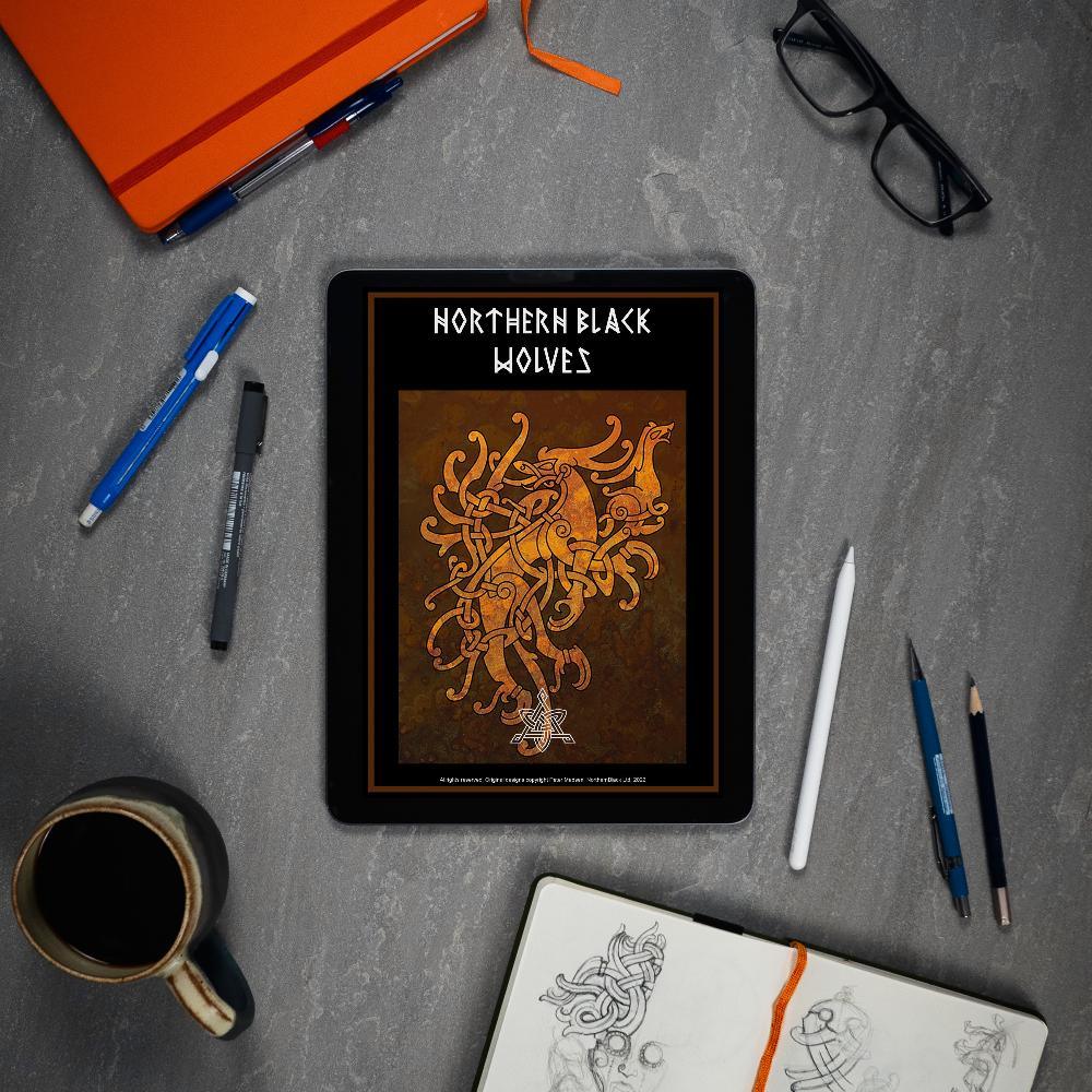 Northern Black Wolves Viking art book on tablet with sketchbook, pens, and coffee