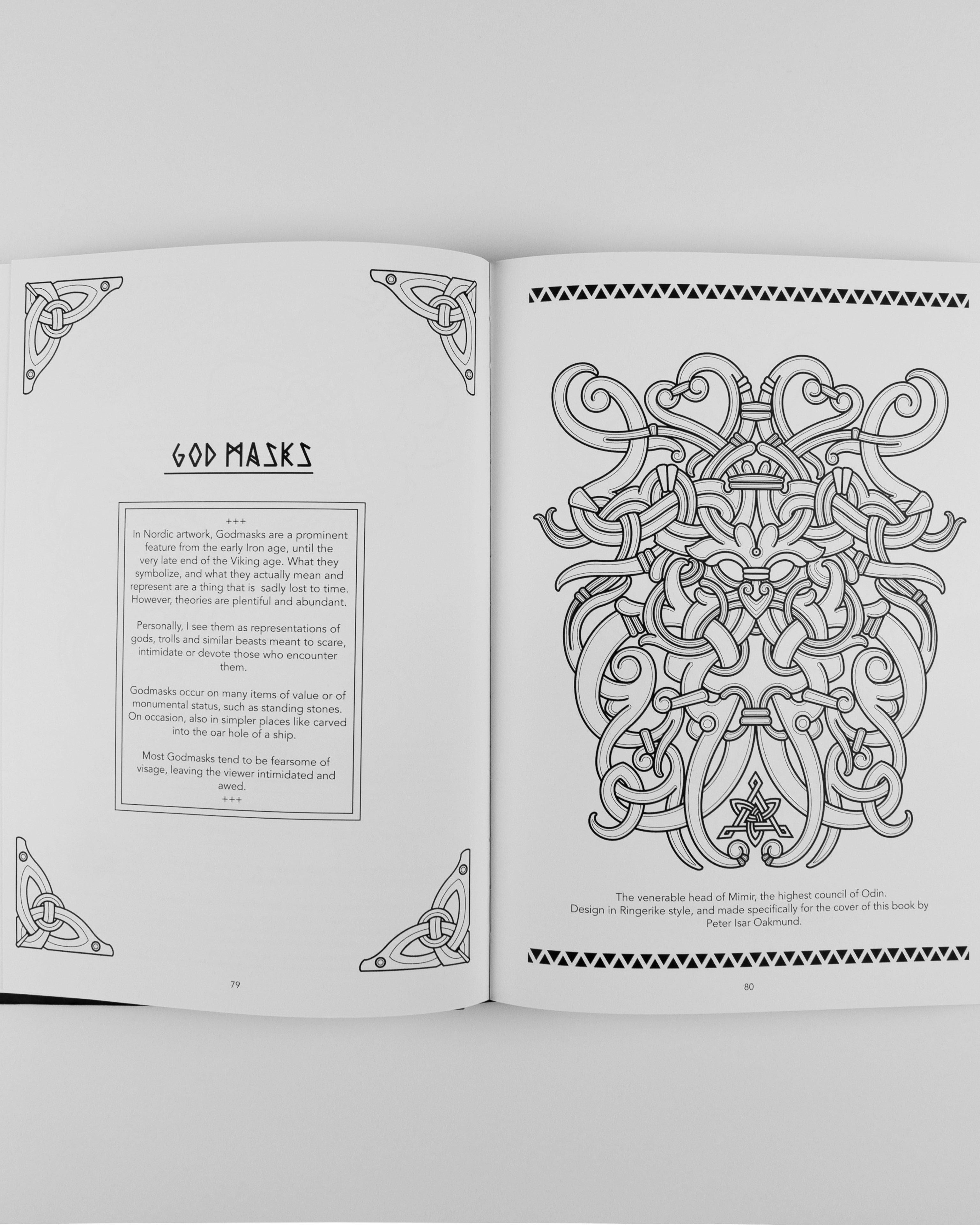 Viking-inspired God Masks art book page with intricate Norse knotwork design