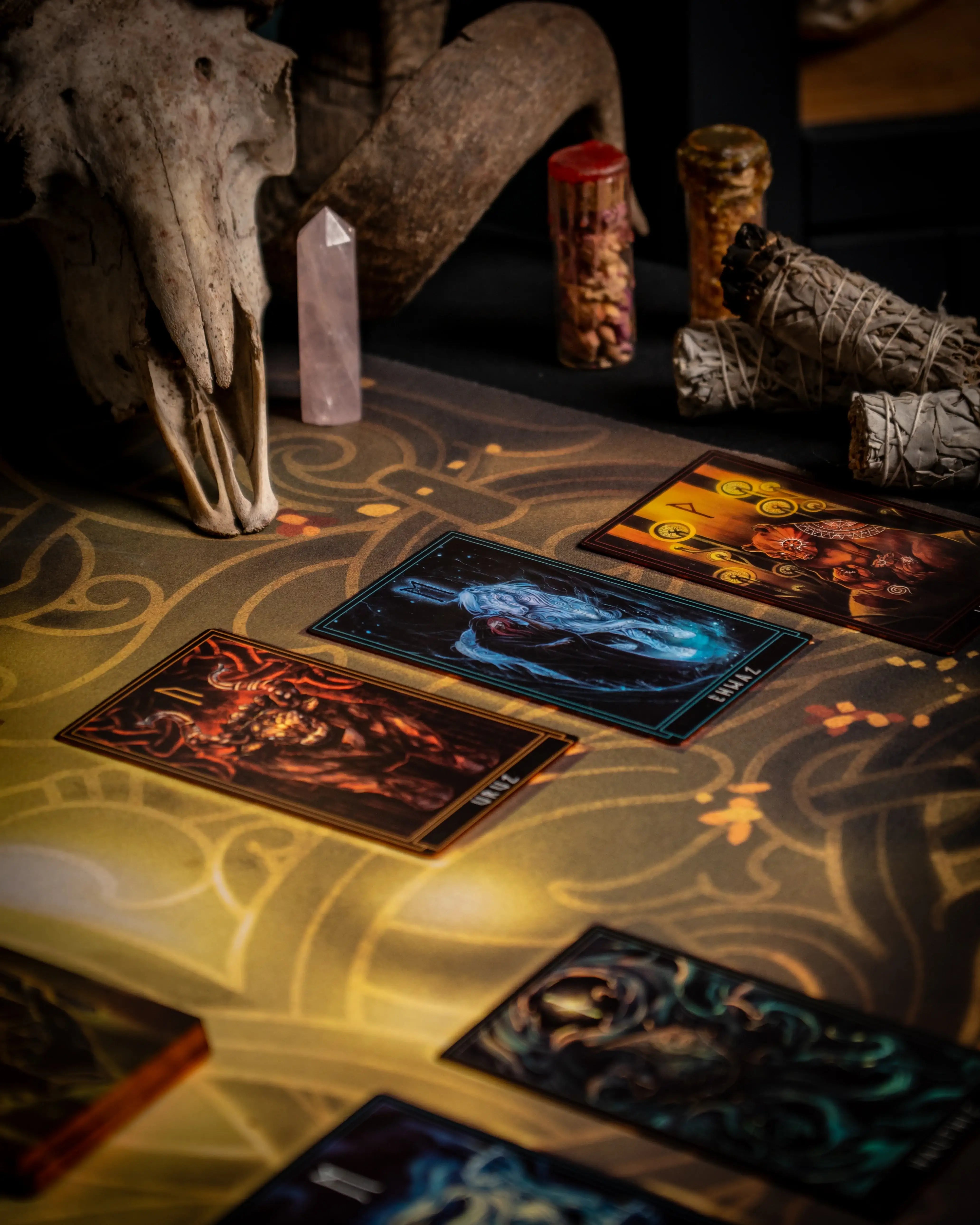Norse-inspired tarot cards with Viking art, runes, and mystical symbols on ornate table