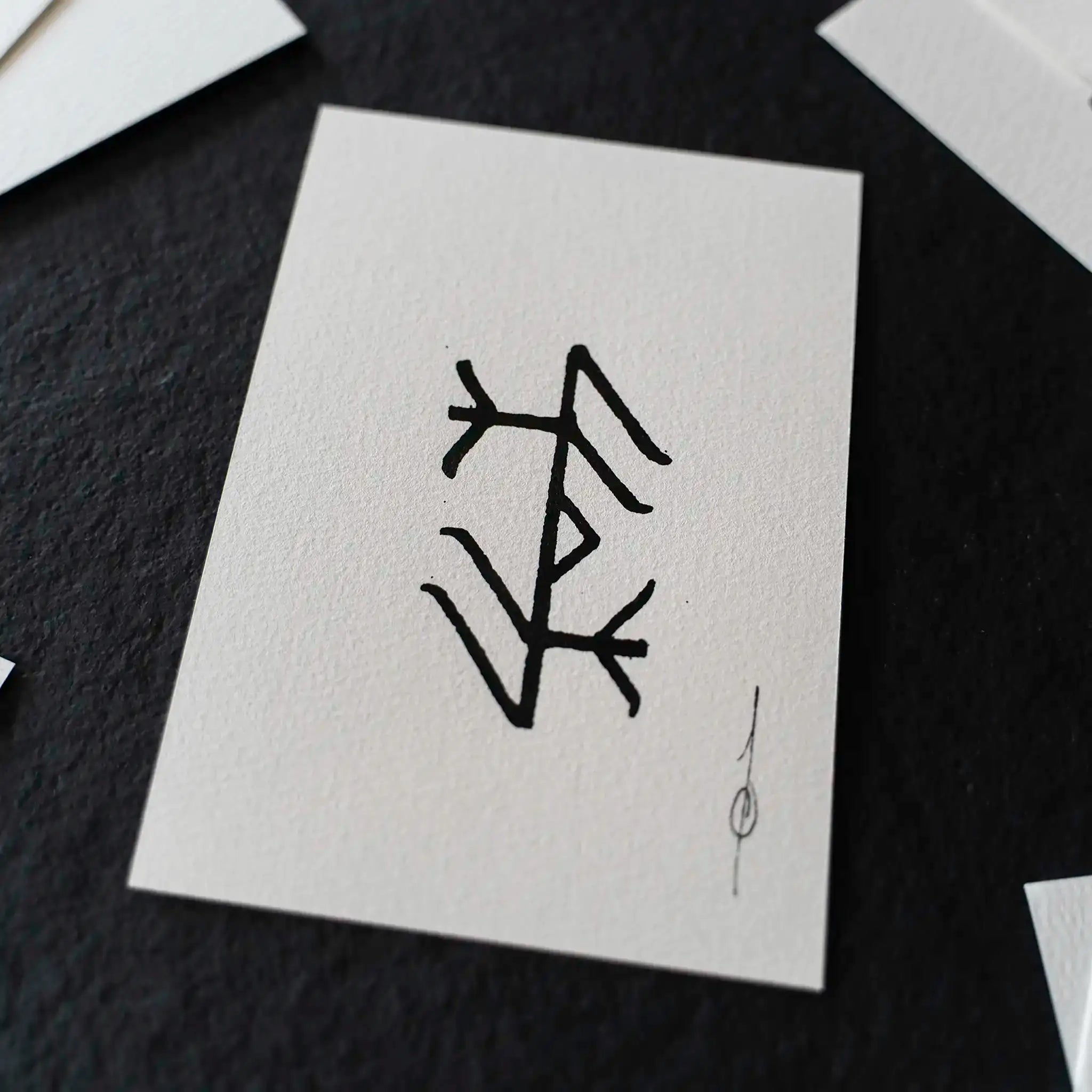Norse rune art print on textured paper, inspired by Viking designs and ancient artifacts
