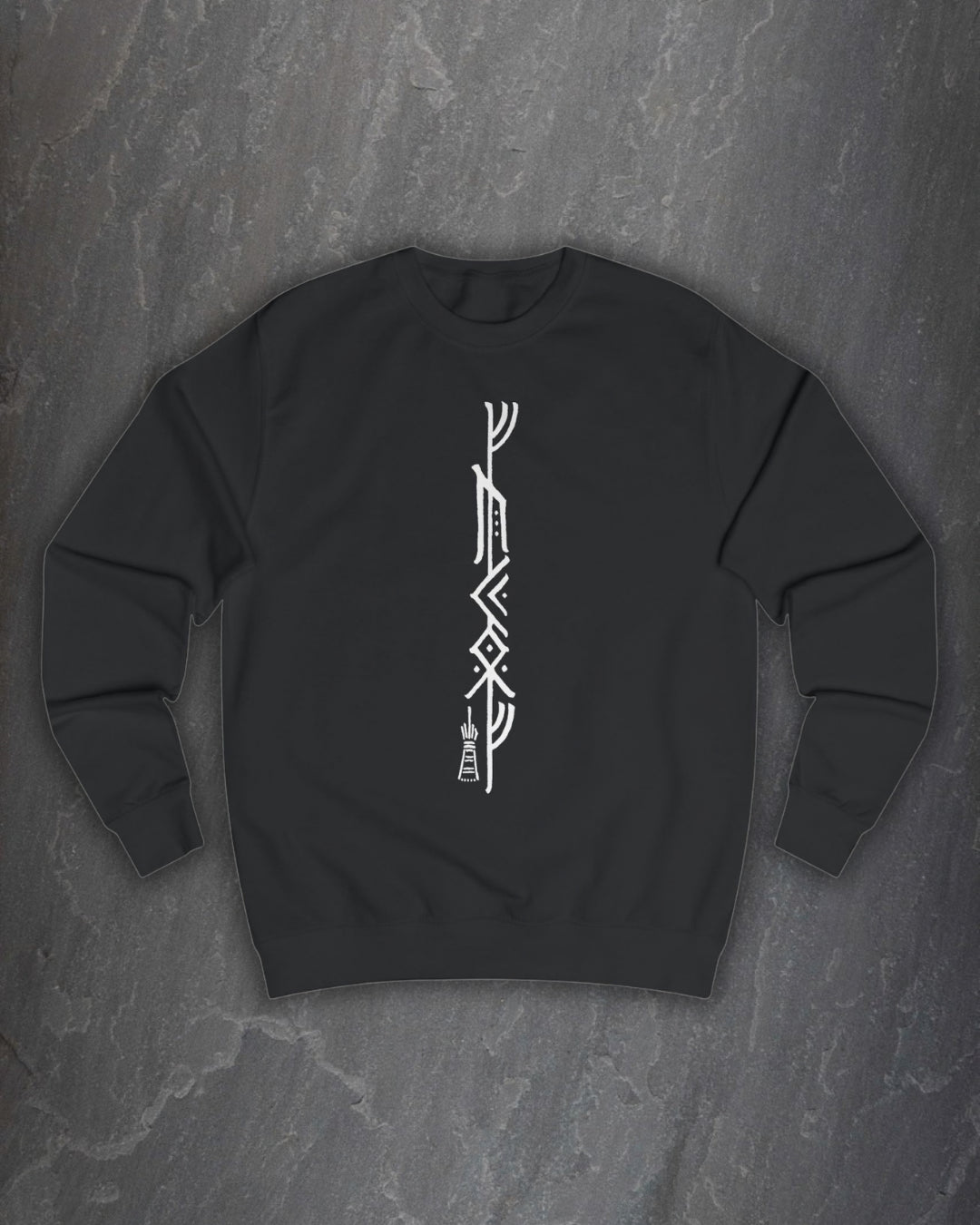 Front of a black F*ck Off Bindrune sweatshirt with a tall white vertical bind rune print on a dark slate background