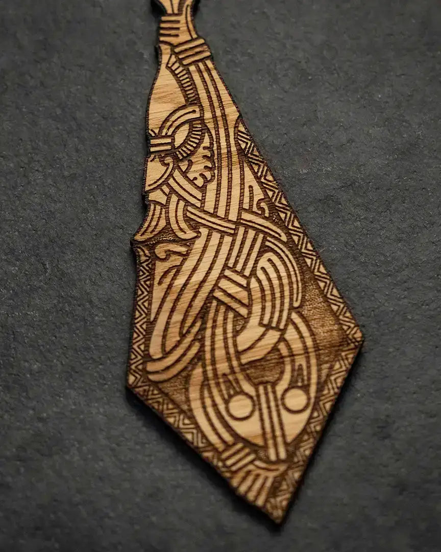 Laser-engraved Norse wood pendant with Viking knotwork and runic patterns, authentic Viking art design
