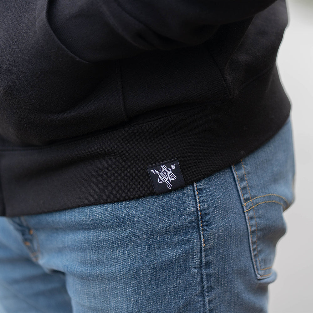 black zip up hoodie with northern black logo embroider on it