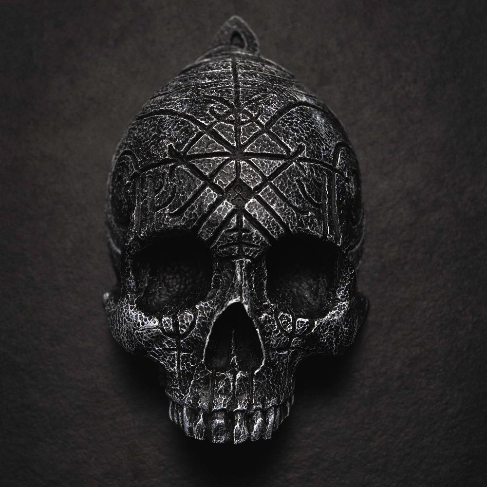 Dark Viking skull pendant with Norse rune carvings and textured metal finish