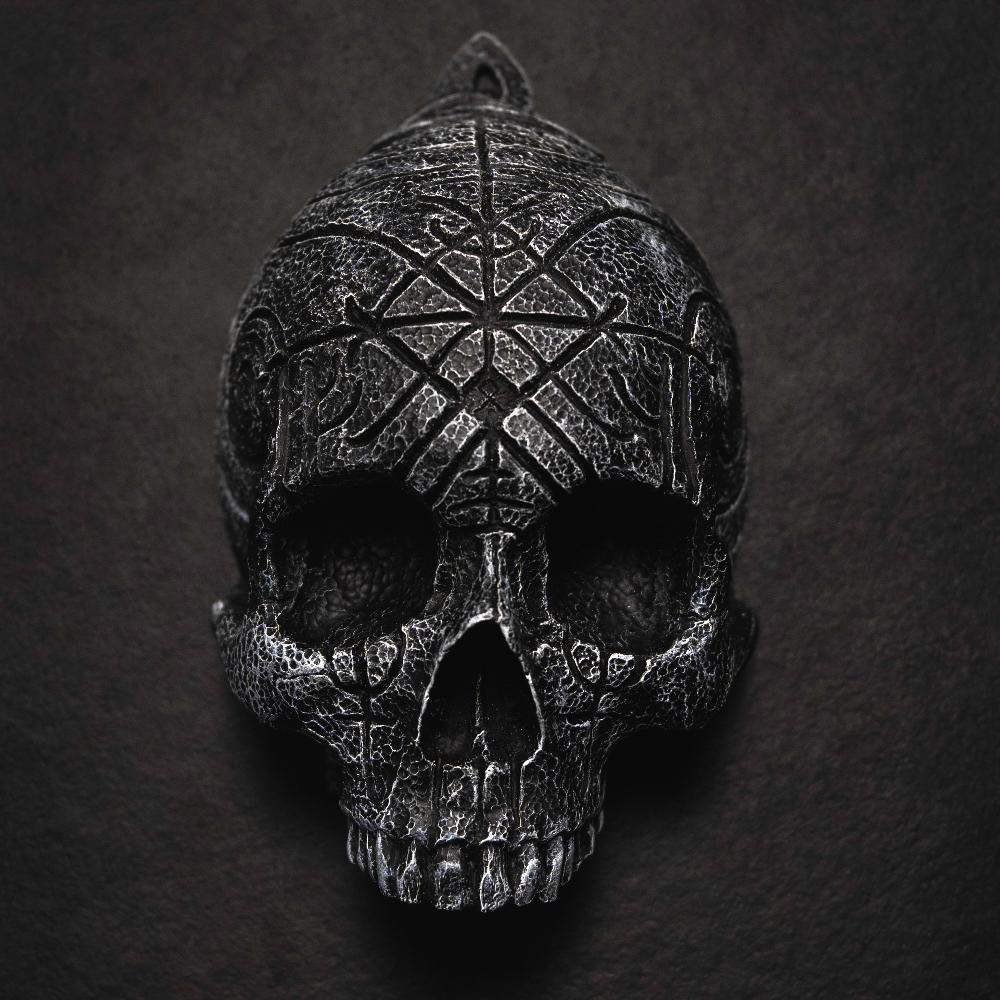Dark Viking skull pendant with Norse rune carvings and textured metal finish