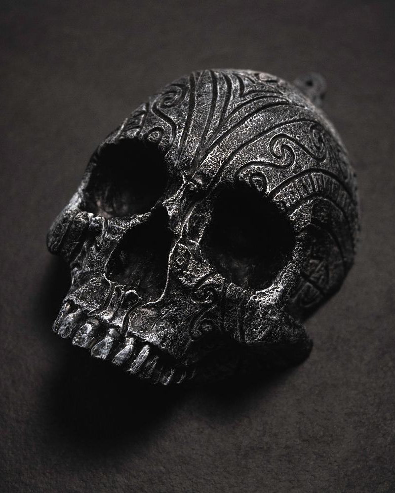 Dark Norse skull pendant with intricate Viking knotwork, inspired by authentic runes and artifacts