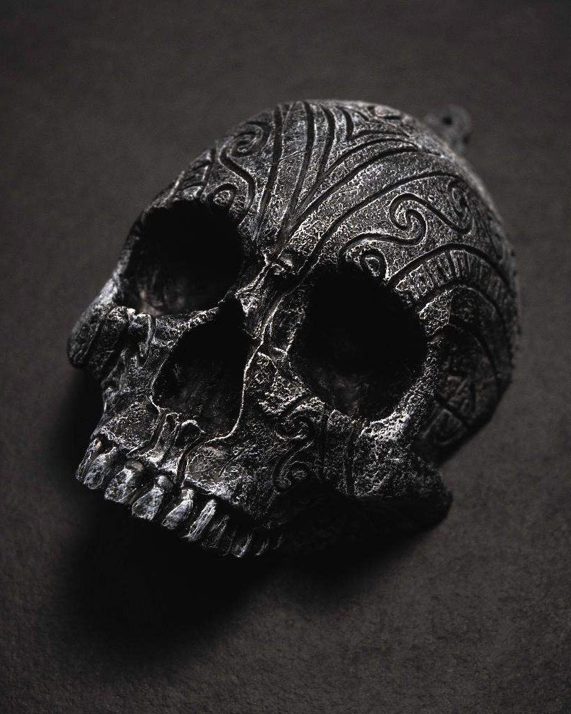 Dark Norse skull pendant with intricate Viking knotwork, inspired by authentic runes and artifacts