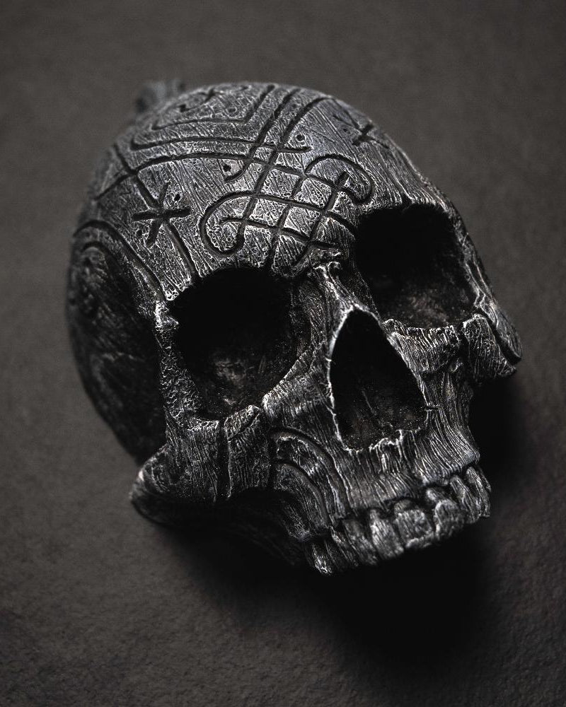 Dark Viking skull with Norse knotwork carvings, inspired by authentic artifacts and runes