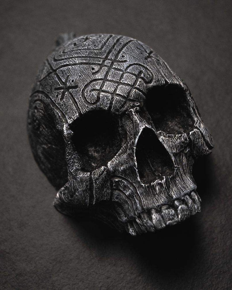 Dark Viking skull with Norse knotwork carvings, inspired by authentic artifacts and runes