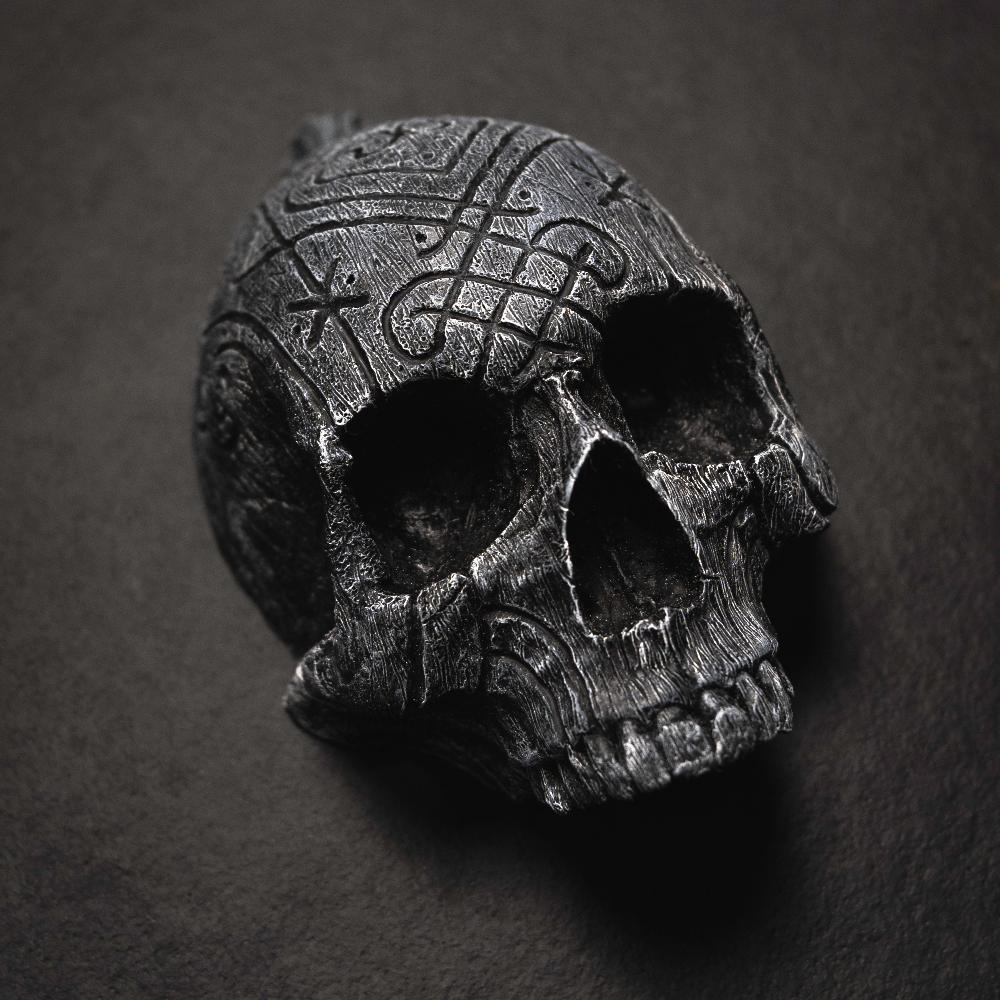 Dark Viking skull with Norse knotwork carvings, inspired by authentic artifacts and runes