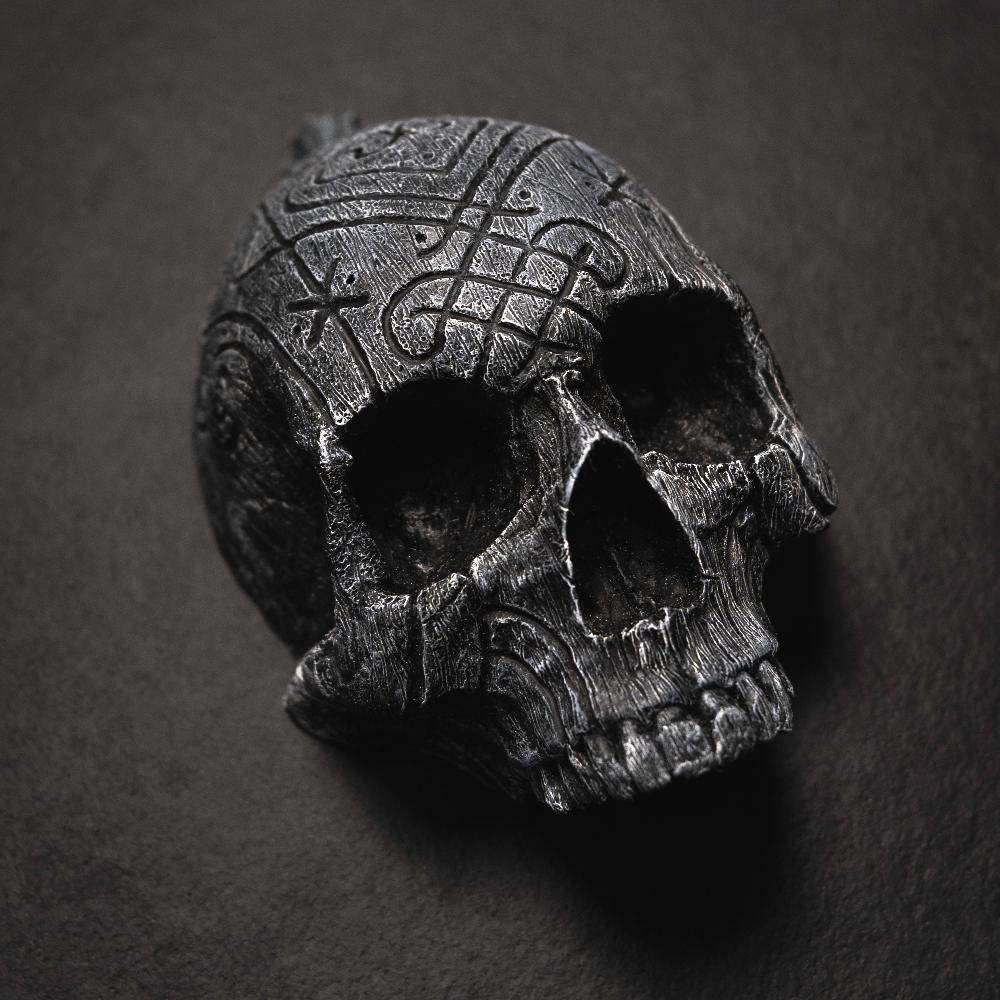 Dark Viking skull with Norse knotwork carvings, inspired by authentic artifacts and runes