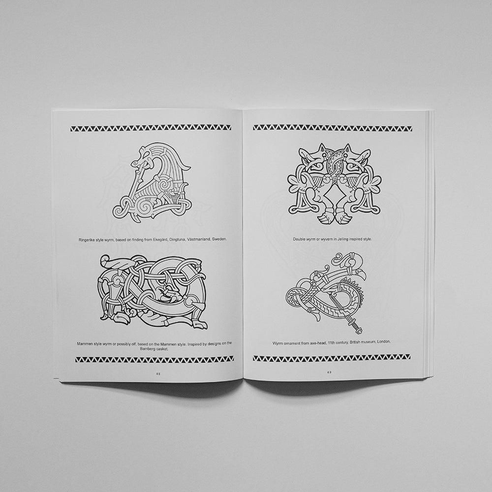Viking tattoo designs book with Norse-inspired wyrms and runes, based on authentic archaeological artifacts