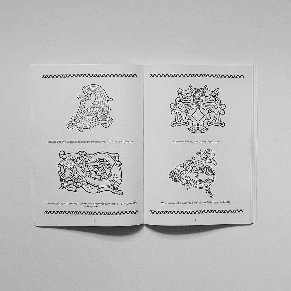 Viking tattoo designs book with Norse-inspired wyrms and runes, based on authentic archaeological artifacts