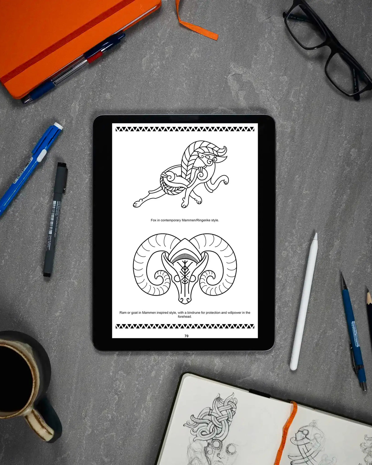 Viking-inspired tattoo designs on tablet: fox and ram in Mammen style, Norse art for tattooists