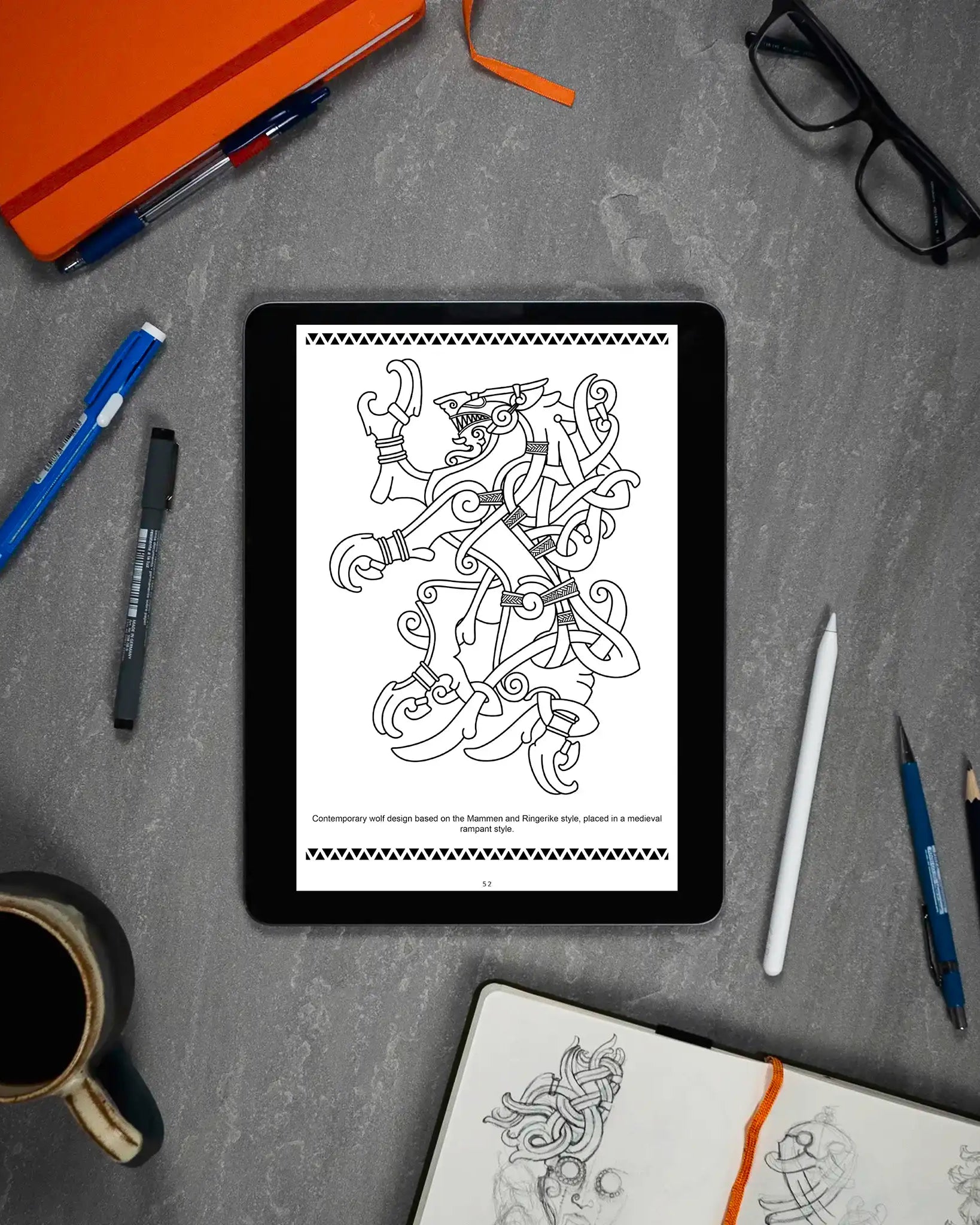 Viking wolf tattoo design on tablet, Norse art inspired by Mammen and Ringerike styles, surrounded by sketch tools