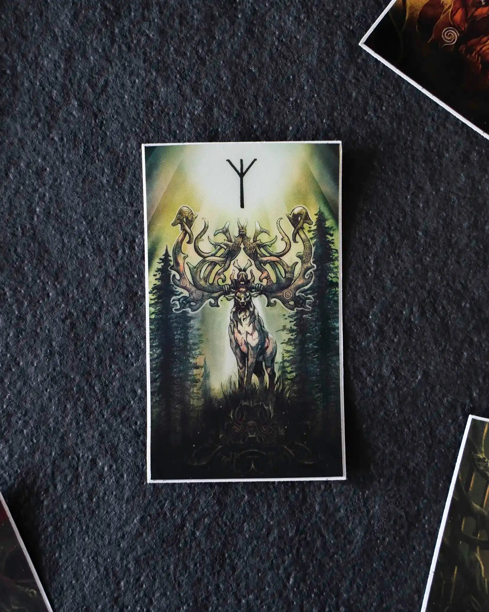 Norse-inspired card with Viking stag, runes, and forest design for tattoo art and collectibles