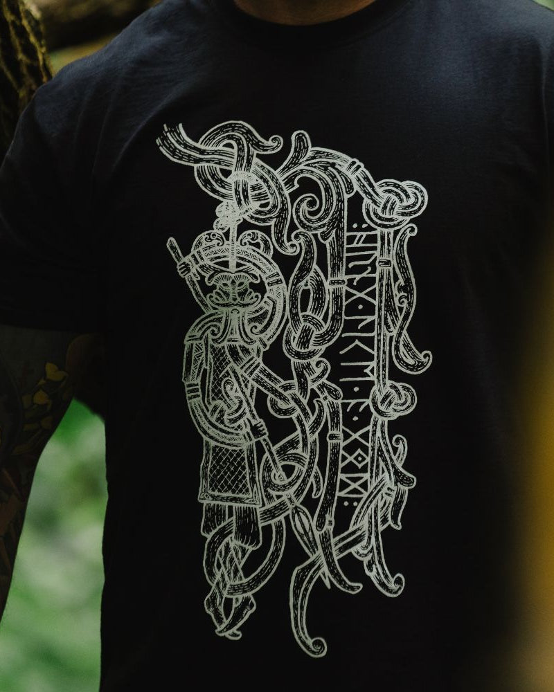 blacktshirt with a white nordic design depicting a god with runes
