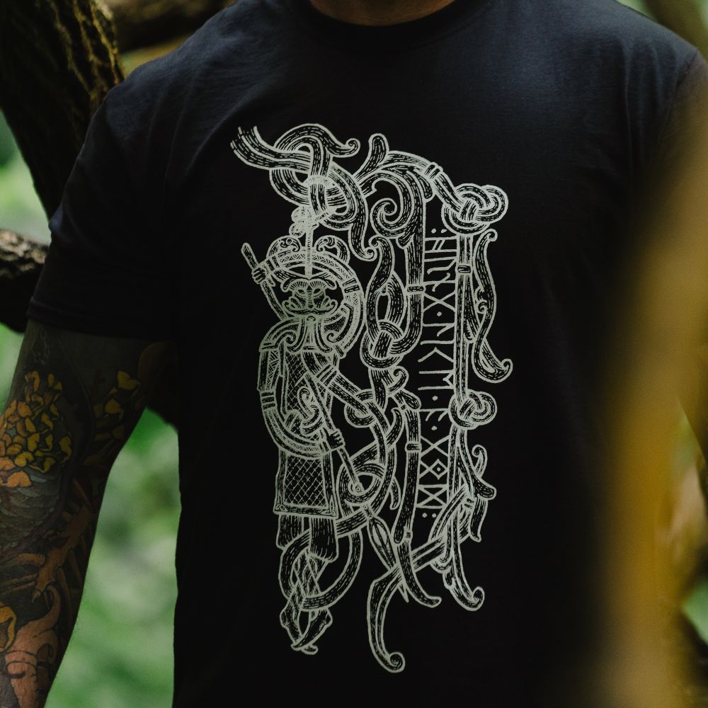blacktshirt with a white nordic design depicting a god with runes