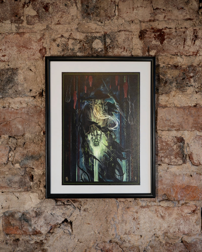 Odin, holding a head surrounded by runes.