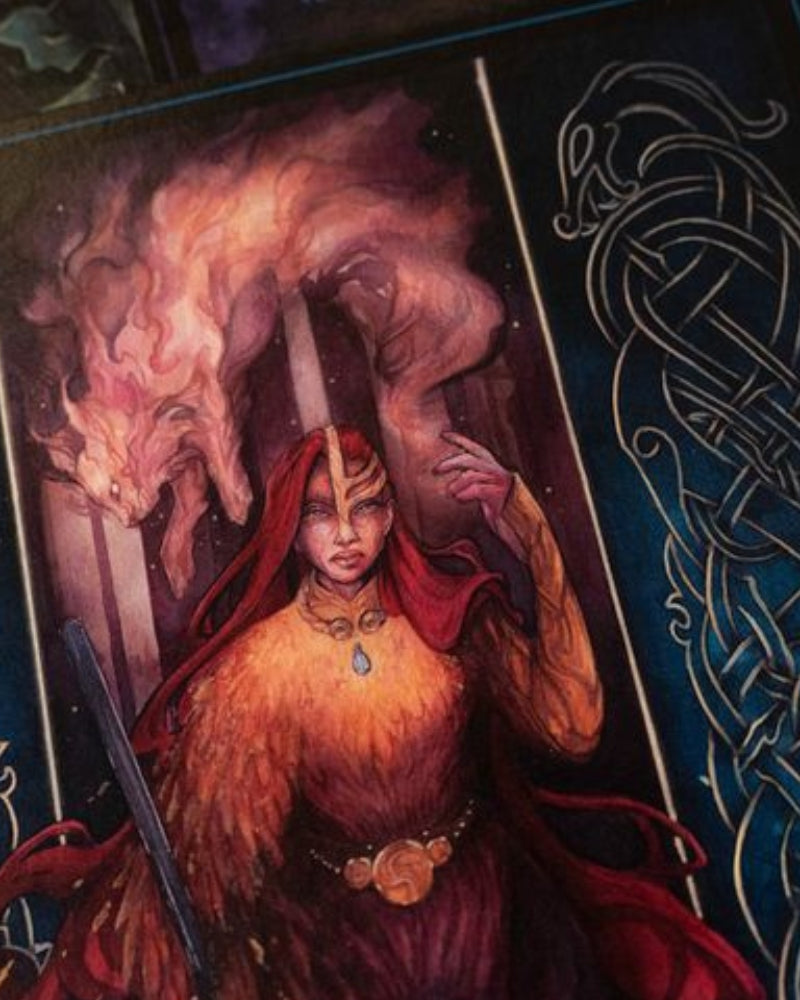 Freya, norse god holding a spear and walking towards the viewer. She is surrounded by two cat like creatures. on both sides of the print there are nordic designs.