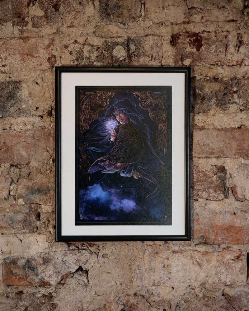Framed Norse-inspired artwork of a wizard with glowing orb, set against rustic brick wall