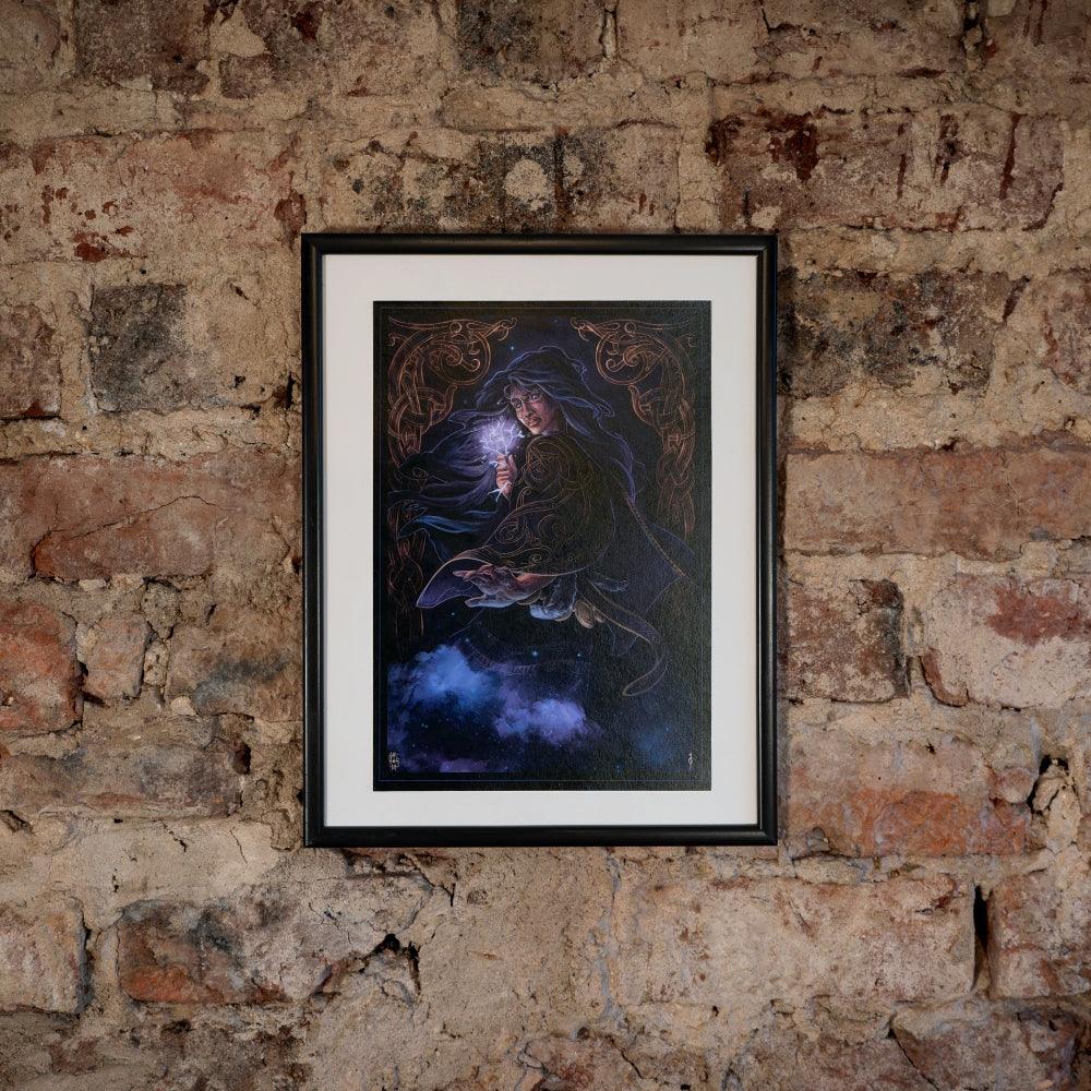 Framed Norse-inspired artwork of a wizard with glowing orb, set against rustic brick wall