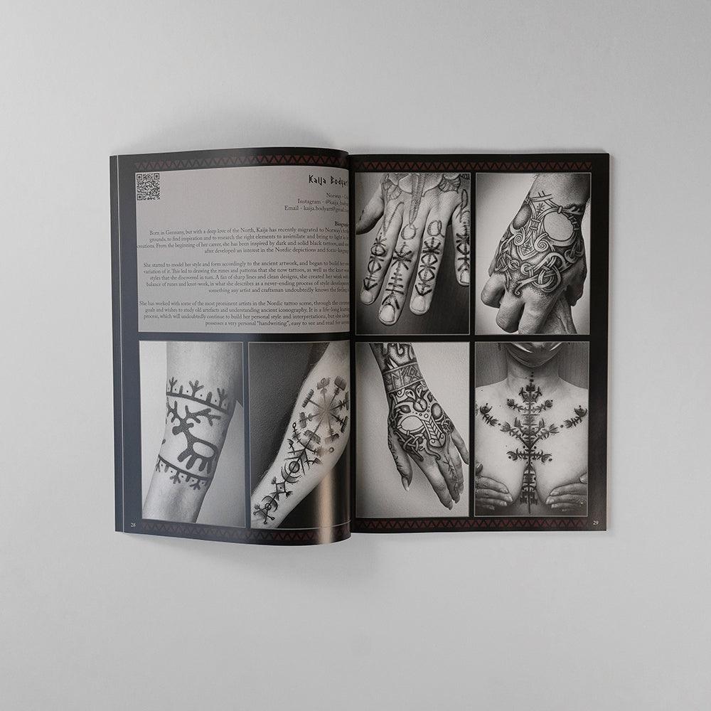 Viking tattoo art book featuring Norse-inspired designs on hands, arms, and chest with runic patterns