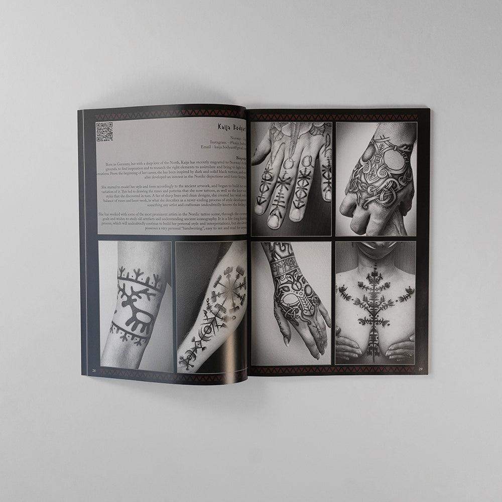 Viking tattoo art book featuring Norse-inspired designs on hands, arms, and chest with runic patterns