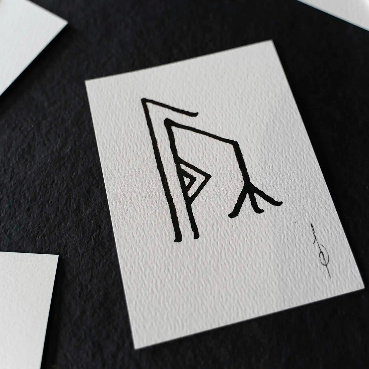 Norse rune art print on textured paper, inspired by Viking designs and ancient artifacts
