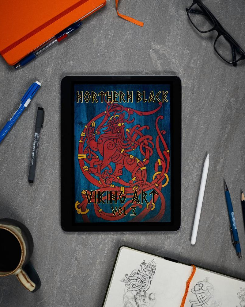 Northern Black Viking Art Vol 3 digital book on tablet with sketchbook, pens, and coffee — Norse tattoo designs
