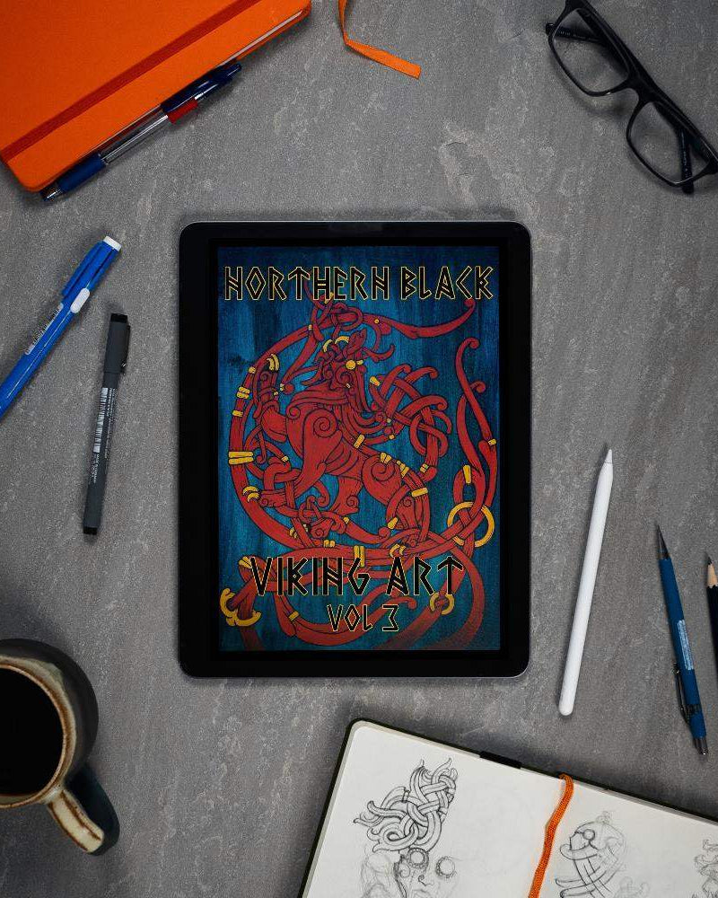 Northern Black Viking Art Vol 3 digital book on tablet with sketchbook, pens, and coffee — Norse tattoo designs