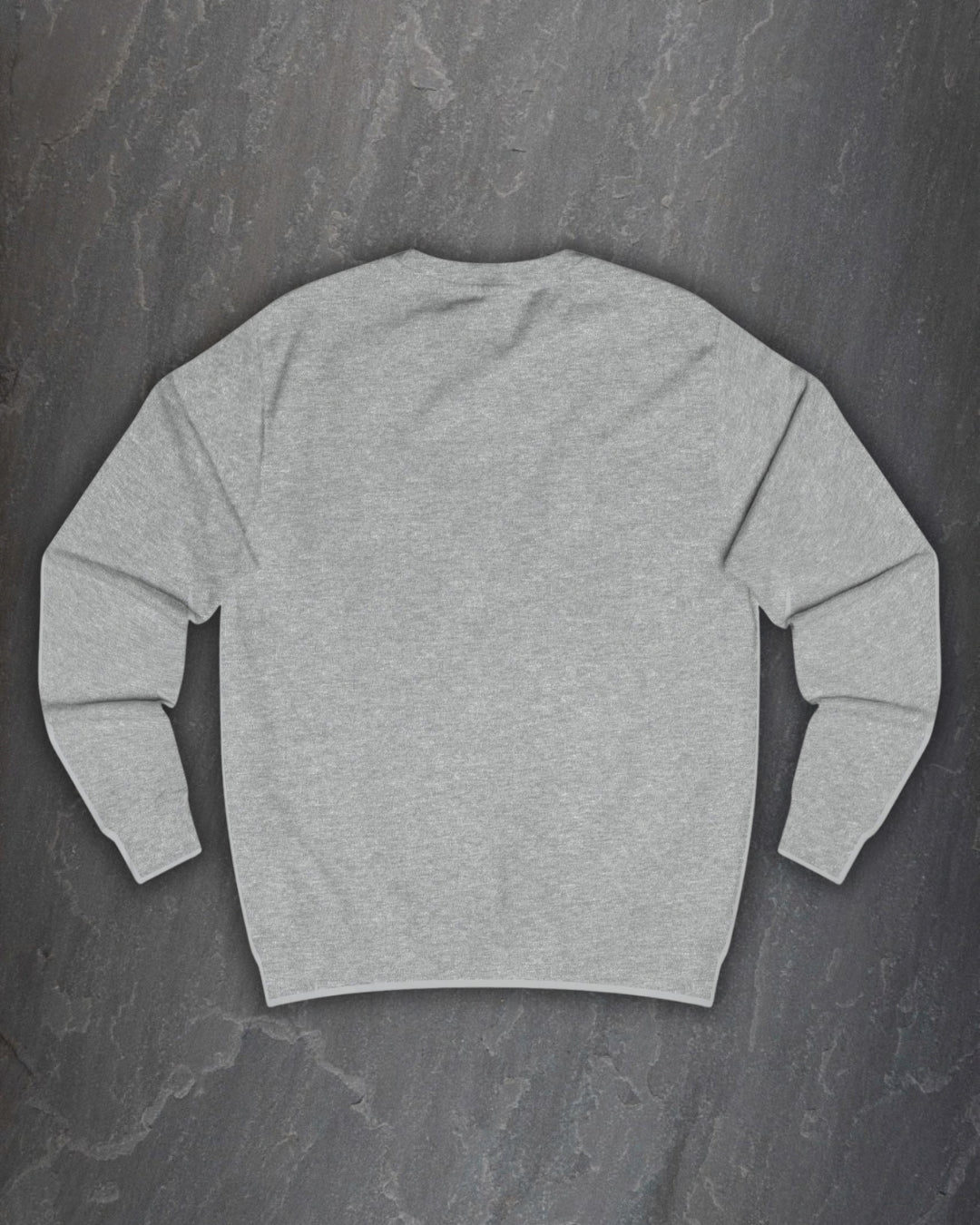 Plain back of the heather grey F*ck Off Bindrune sweatshirt on a dark slate background
