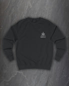 Front of a black Lifthrasir sweatshirt with a small Northern Black logo on the chest on a dark slate background
