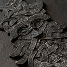 Intricate Norse-inspired resin sculpture with Viking knot patterns and textured finish