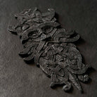 Viking-inspired resin sculpture with intricate Norse knotwork and mythical creature design