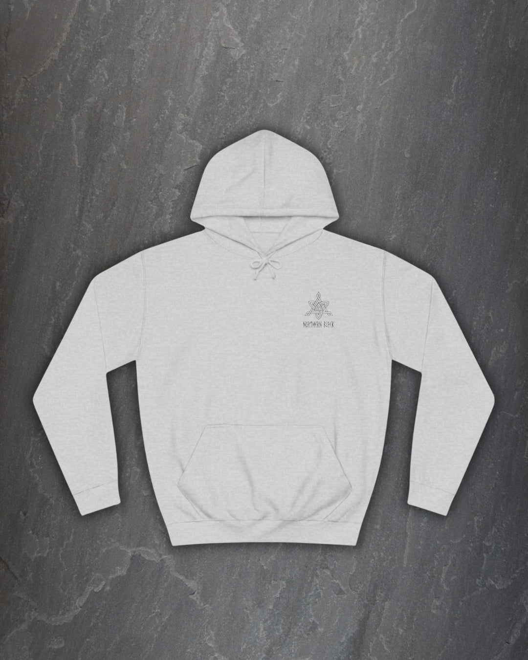 Front of a heather grey Yggdrasil hoodie with a small Northern Black logo on the chest on a dark slate background