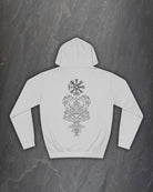 Back of a heather grey Yggdrasil hoodie with a black Norse world tree and runic compass print on a dark slate background